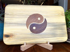 Poplar charcuterie board with Yin Yang inlay made from White Oak and Peruvian Walnut.