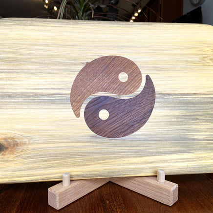 Poplar charcuterie board with Yin Yang inlay made from White Oak and Peruvian Walnut.