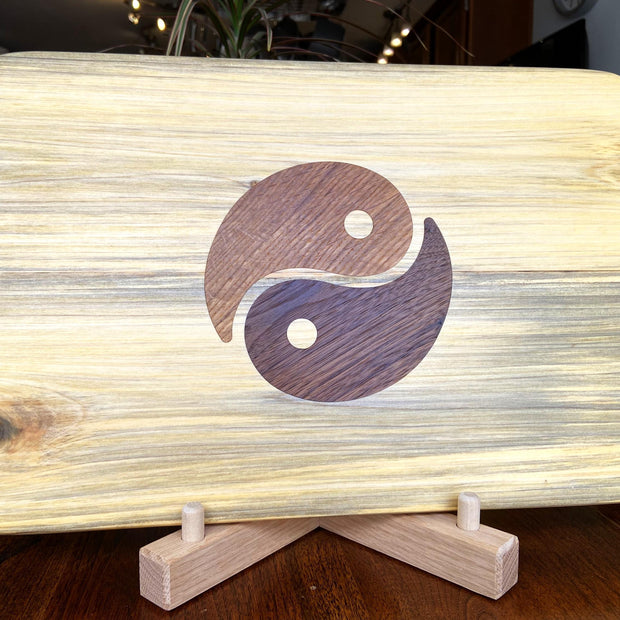 Poplar charcuterie board with Yin Yang inlay made from White Oak and Peruvian Walnut.