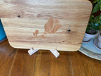 White Oak charcuterie board with subtle rose and stem inlay made from Cherry.