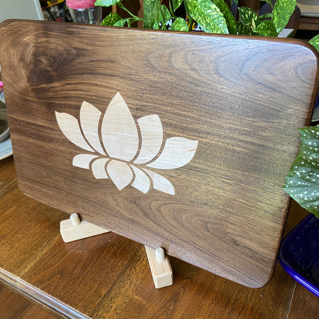 Stunning Walnut charcuterie board with Lotus Flower inlay made from soft Maple.