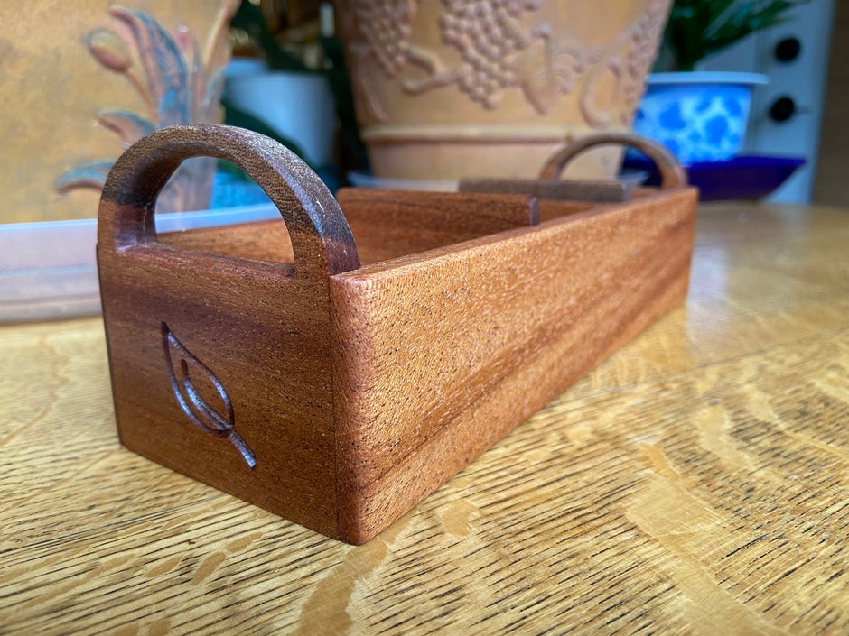 Hand-made and engraved tea caddy made from Mahogany