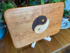Cherry charcuterie board with Yin Yang inlay made from Peruvian Walnut and Maple.